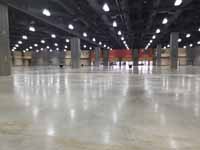Versacourt indoor sport tile volleyball courts in convention center for New England Regional Volleyball Association (NERVA) Winterfest 2020 tournament in Hartford, CT. Large section of convention center showing blank slate before courts were in.