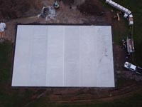 Overhead view of concrete base ready for court surface and accessories to be installed in Easton, MA.