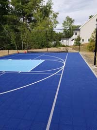 Backyard pickleball and basketball in Groveland, MA.