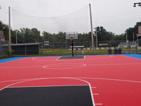 Town of Paxton, MA municipal basketball court resurfaced and improved with new primary goal systems.
