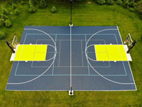 Example picture overlooking a multicourt constructed with SnapCourts surface tiles. Multiple games or sports are possible, including basketball, volleyball, tennis, and pickleball.