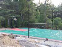 Residential basketball court plus tennis and volleyball in Pembroke, MA.
