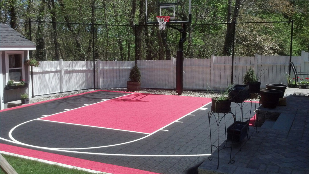 Home basketball court in Hingham, red and black, started in winter and finished early spring.