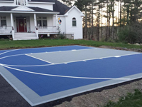 Quick Versacourt tile basketball surface on blacktop driveway in Plympton, MA.