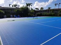 Caribbean tennis court restoration at Sandals Grande Antigua Resort and Spa in St. Johns, Antigua.