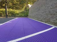 Small purple and black basketball court in Stoneham, MA.