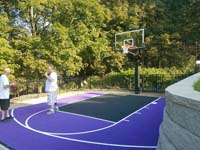 Backyard basketball court taking advantage of a small, unused spot in Stoneham, MA.