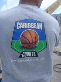 Bob Whyte in Barbuda, showing off a Caribbean Courts shirt.
