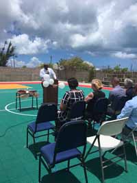 Replacement tennis and basketball courts in Codrington, Barbuda, courtesy of Australia, the Red Cross, and community effort, part of the ongoing recovery from hurricane Irma. Shown here: officials at dedication ceremony for new courts.