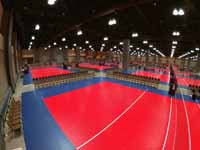 Versacourt indoor game tile volleyball courts in convention center for New England Regional Volleyball Association (NERVA) Winterfest 2020 tournament in Hartford, CT. Some of the completed courts shown here.