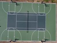Overhead view of large tennis plus basketball court in Easton, MA.