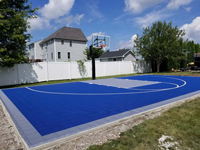 Blue and titanium tiled basketball court in North Attleboro, MA.