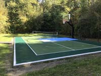 View from right end of basketball pickleball home multicourt in Westport, MA.