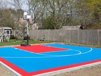 Light blue and red home game court for sports in Beverly, MA.