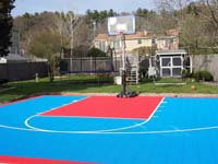 Light blue and red sport surface for basketball court in Beverly, MA.