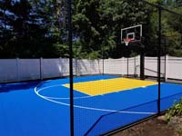 Royal blue and yellow basketball court and accessories in Stoneham, MA.s